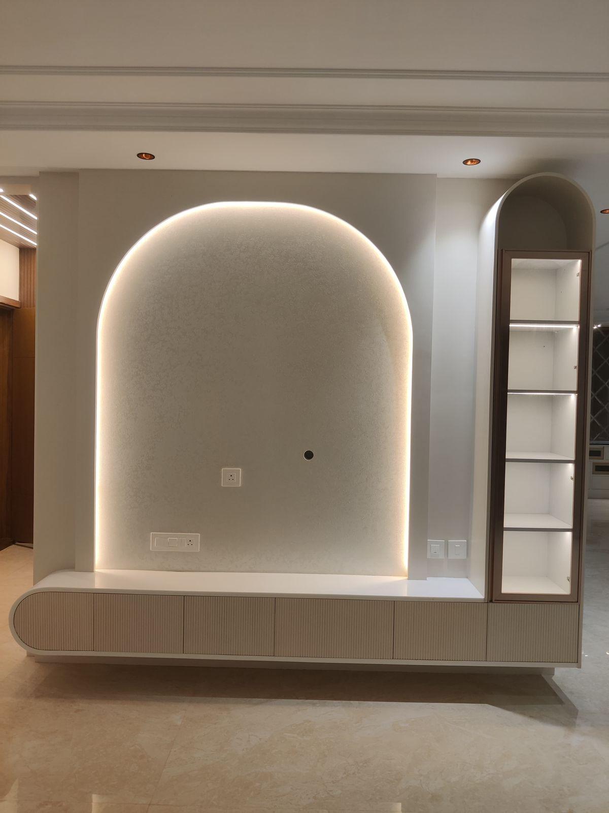 Arched feature wall interior design with ambient lighting
