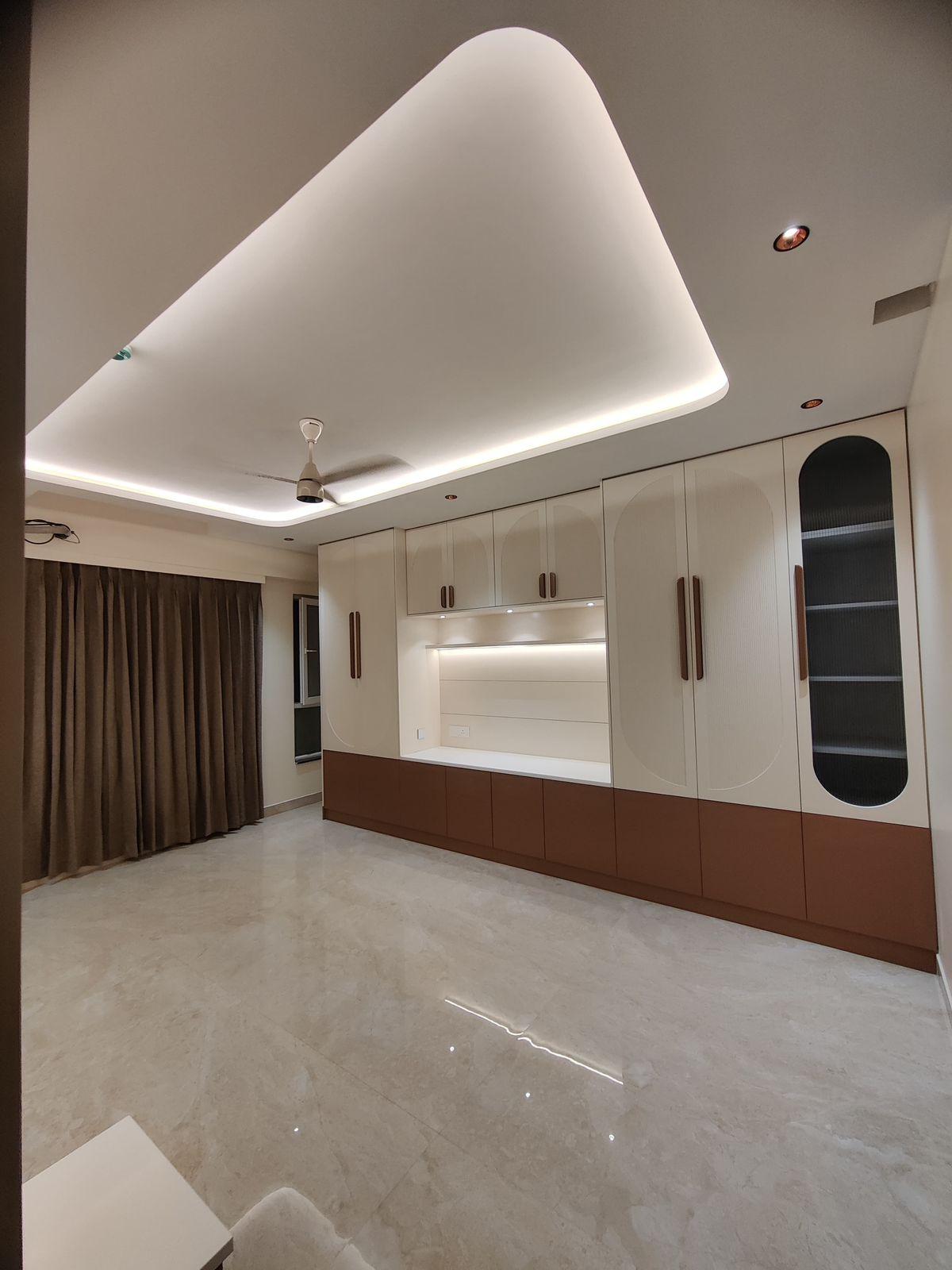 Curved false ceiling design for modern living hall