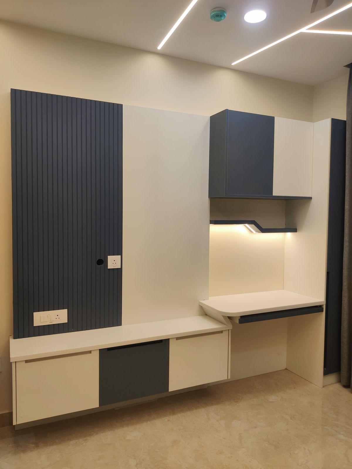 Custom blue and grey TV unit design for home interiors