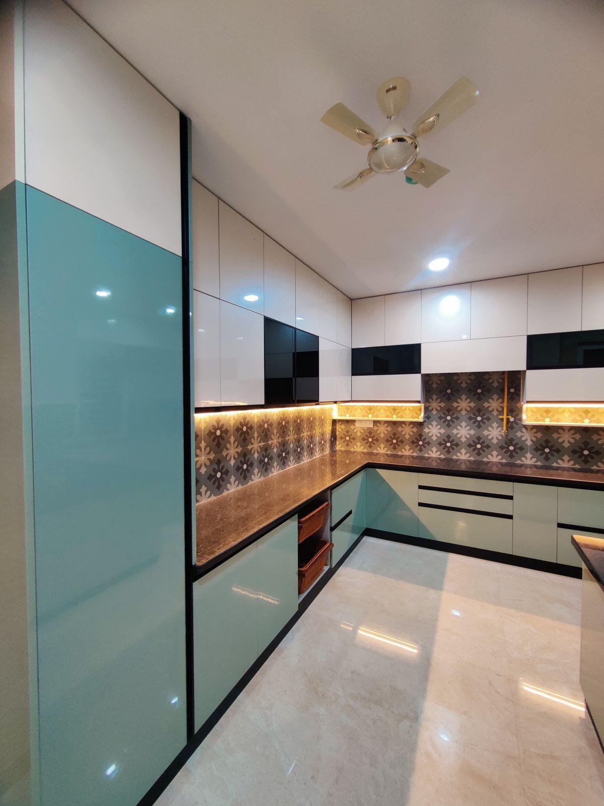 Modern blue modular kitchen interior design in Chennai