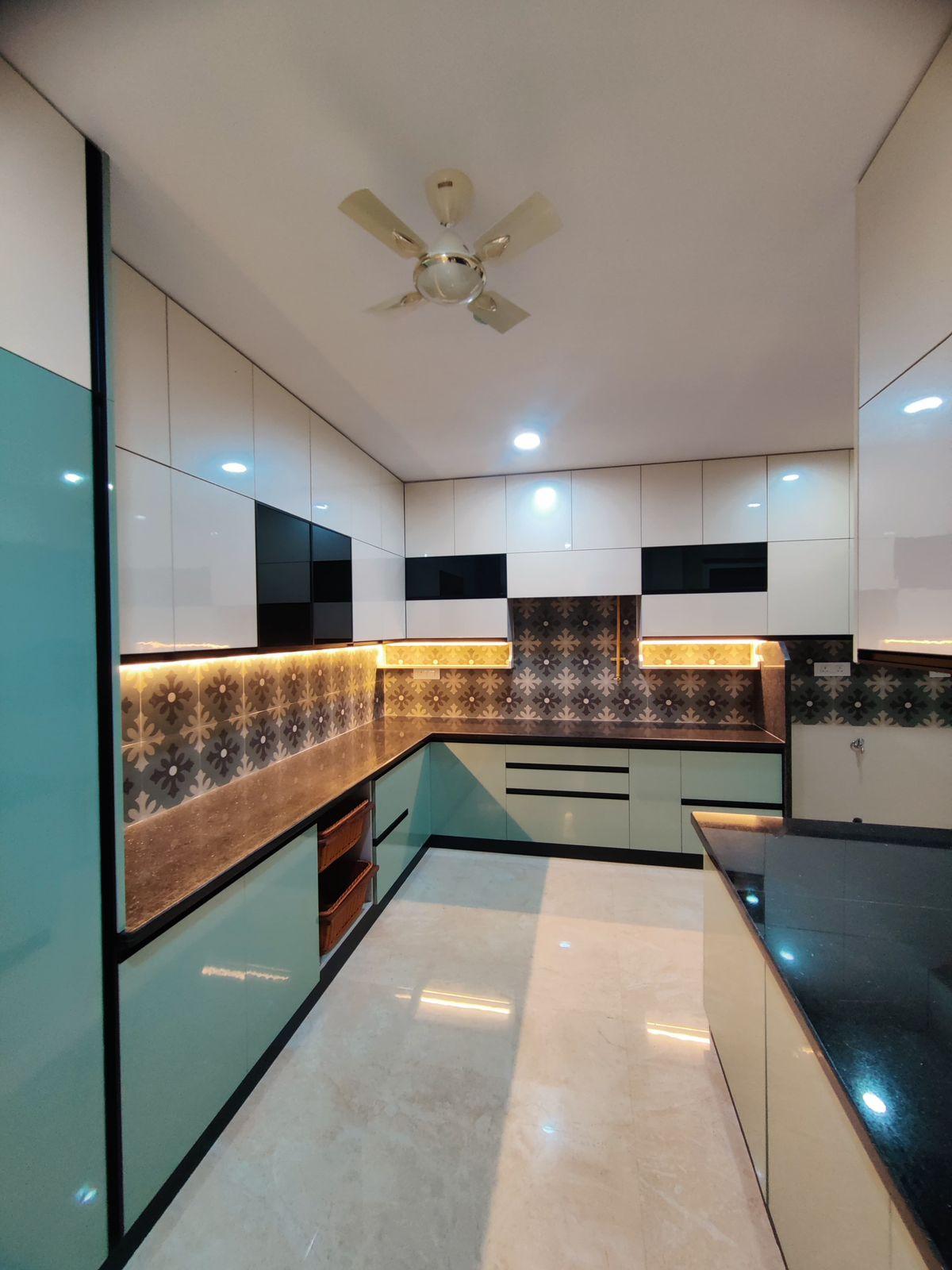 Modern blue and brown modular kitchen interior design